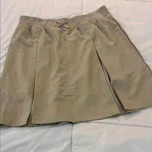 Tan Pleated Mini with Bow Detail and built in shorts.. French Toast- Girl Scouts